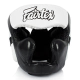 Black and white boxing headgear with Fairtex logo on a white background